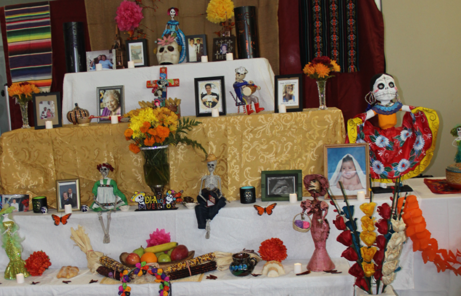 Photographs%2C+candles%2C+food+and+personal+belongings+are+some+of+the+objects+placed+on+the+ofrenda+during+Dia+de+Los+Muertos.+The+Puente+Club+organized+their+own+Dia+De+Los+Muertos+Community+Celebration+on+Thursday.