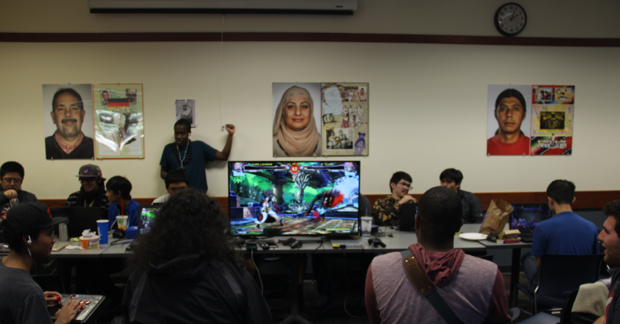 Students like to play fighting games such as “Guilty Gear Xrd” on a computer monitor in the cafeteria. The games played at the table range from new releases to more retro titles.
