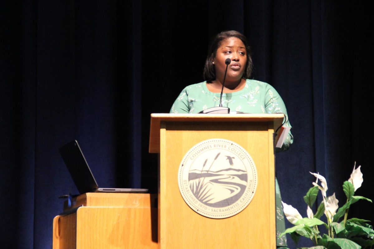 Main speaker Keisha Ray explains to the audience that black women in America are three times more likely to die during or soon after childbirth than white women. The event was part of the two-day Fall Ethics Symposium, the second day held at Cosumnes River College on Nov. 19.