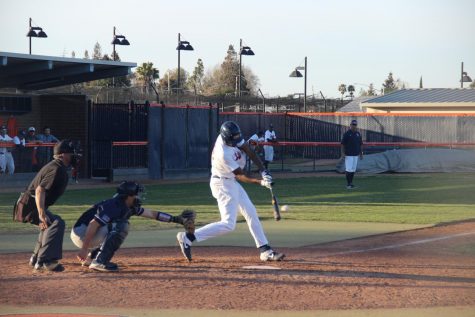 Sophomore outfielder Lakeal Morris hitting a ball to right field against the American River College Beavers on Feb. 24, 2020. Spring sports are in the clear to return to practicing and conditioning, and hopefully competition, as long as Sacramento county stays in the red tier.