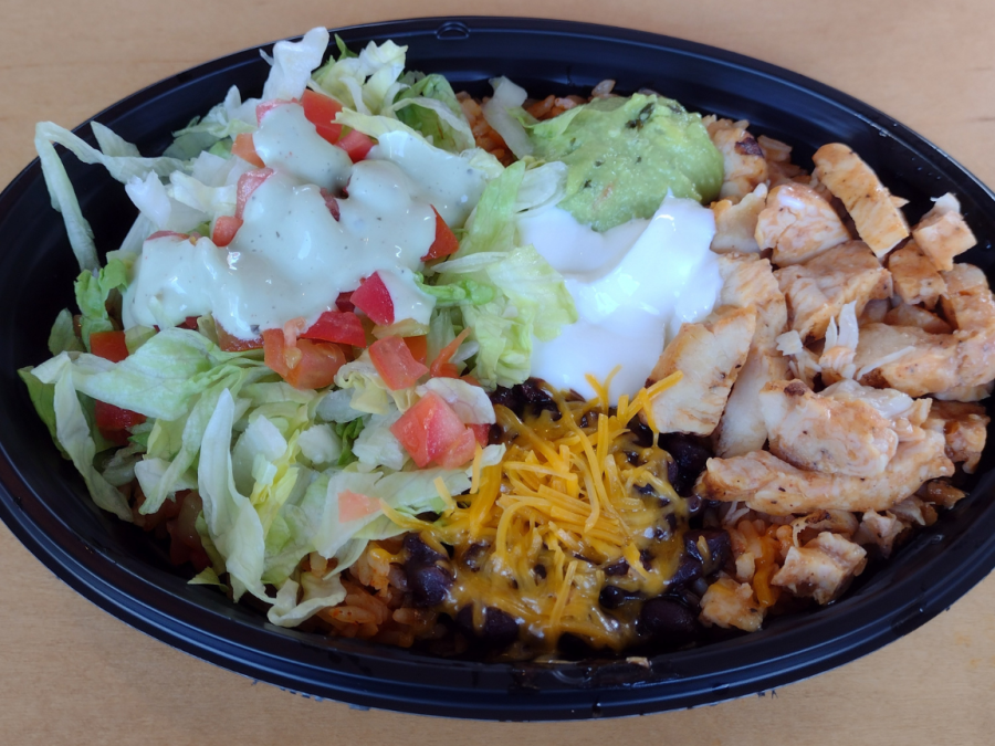 There are many affordable lunch options where students can go eat within walking distance from campus for under $15. One of these places is Taco Bell, and featured here is the chicken power menu bowl for $6.19.