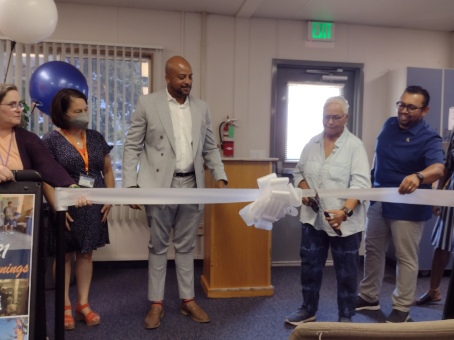 The Hawk CARES Center held a grand opening on Thursday to present the center. Faculty gets together to cut the ribbon for the grand opening.