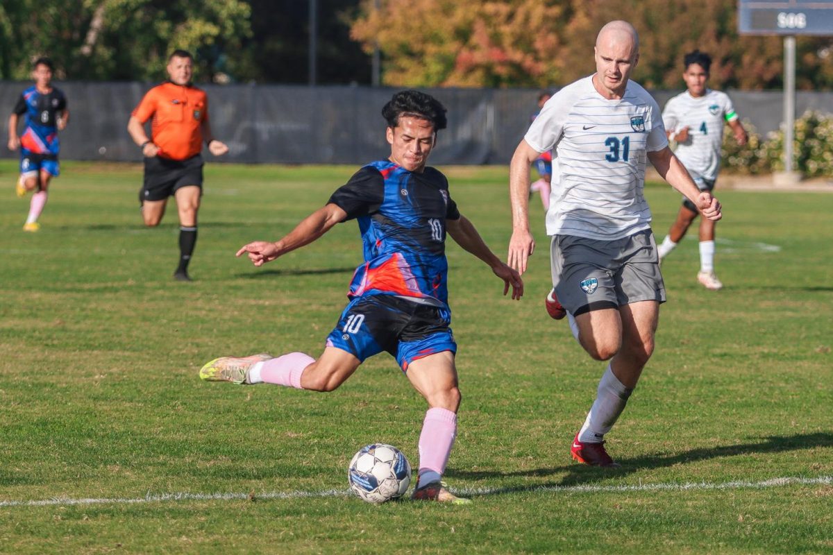 The men's soccer team defeats Clovis Community College 4-2 on Tuesday.  Cosumnes River College striker, Jordan Hongphackdy, takes a shot at the goal.