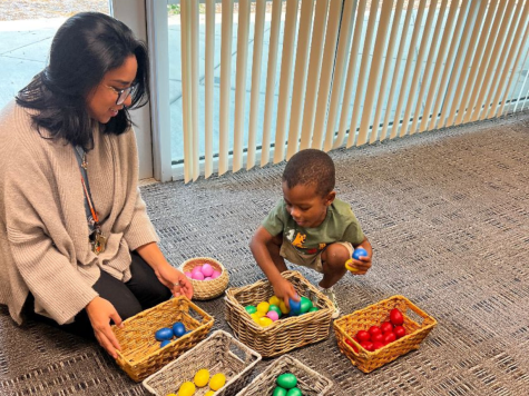 Parent Connect zoom events are designed to support student parents on campus. Featured here is Student Support Specialist Emily Salgado playing with the child of a student parent in the Child Development Center.