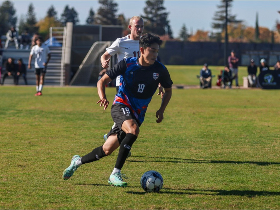 The men's soccer team beat Las Positas College 6-1 on Saturday and advanced to the third round of the playoffs. Midfielder Anthony Sanchez-Raya driving down the field with the ball.