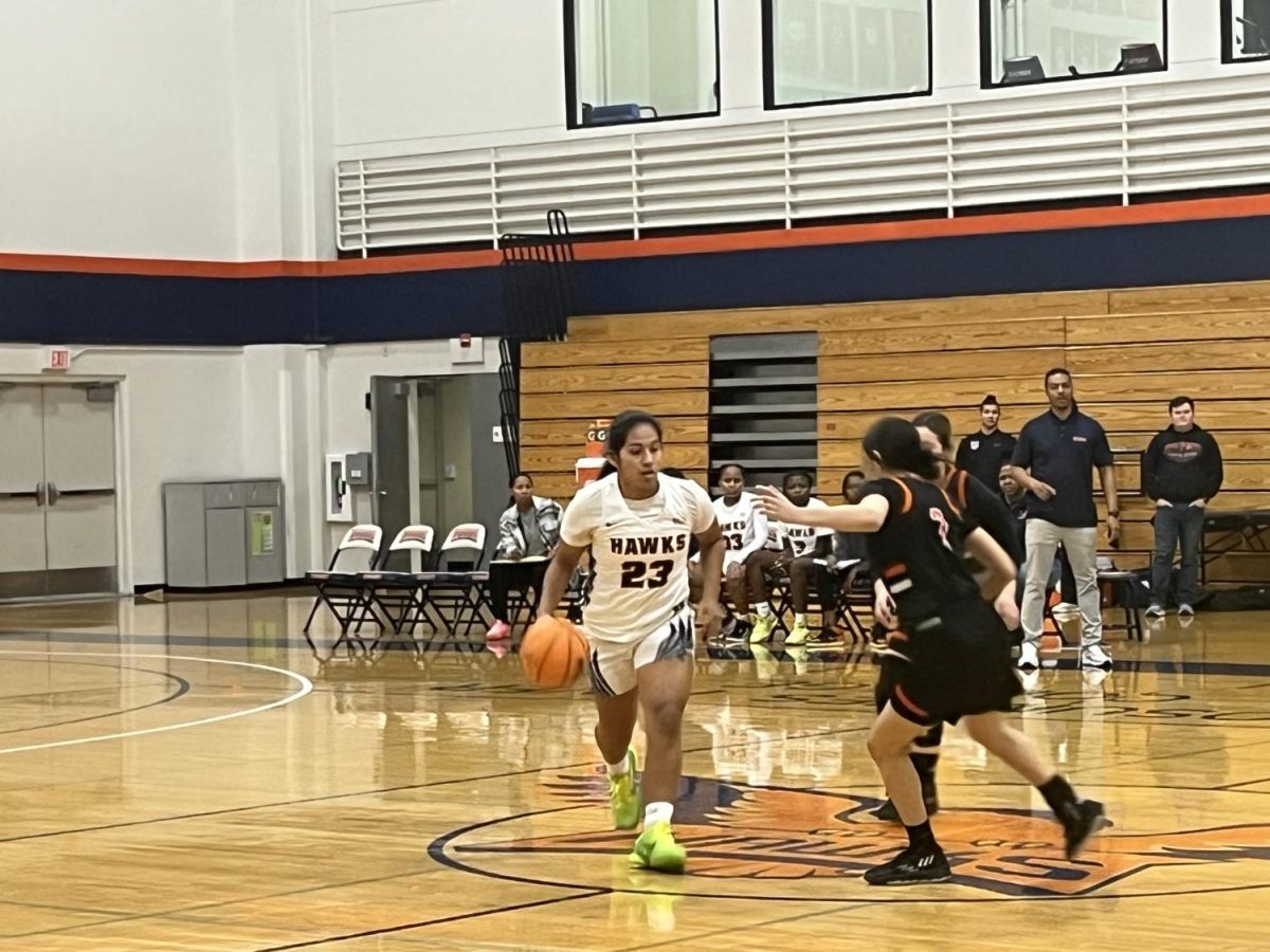 Team captain and point guard Ashley Gonzalez in transition on Tuesday against Lassen Community College. Gonzalez finished the game with 29 points.