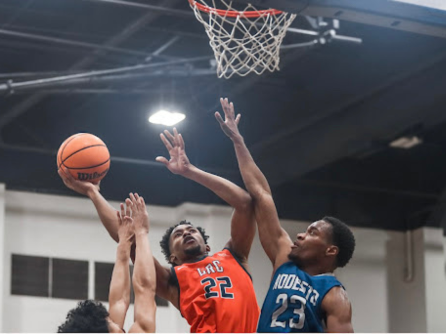 The CRC mens basketball team beats Modesto Junior College Pirates for their sixth win in a row on Tuesday. Sophomore wing LaDarious Stanfield goes up for a layup against MJC defense.