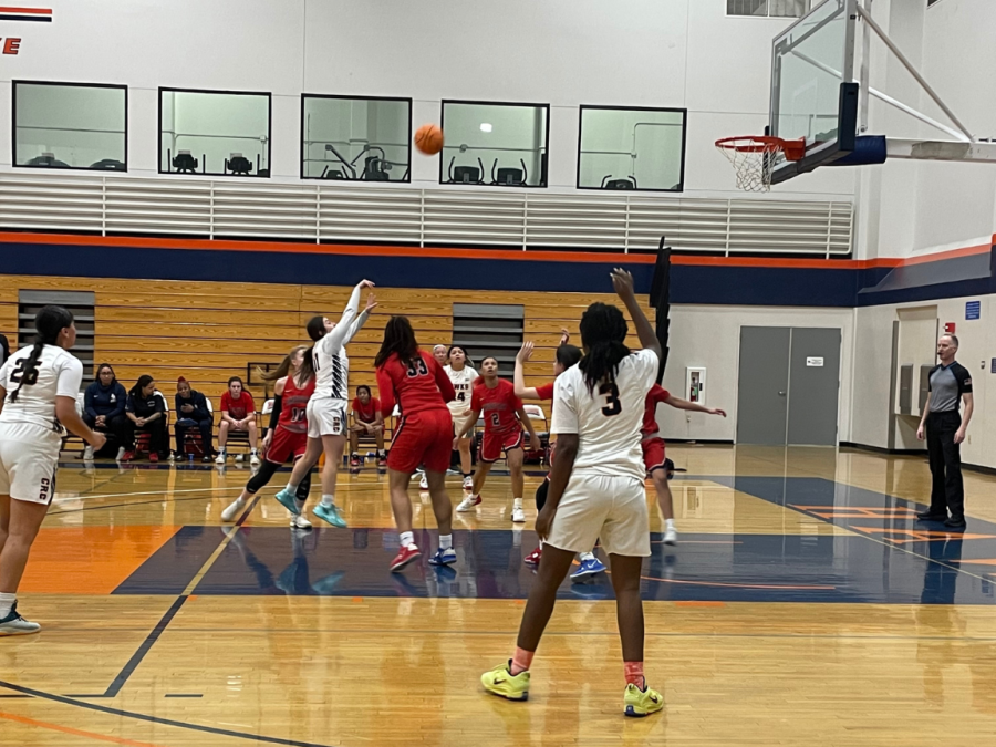 Freshman guard Luisa Contreras shooting a field goal while surrounded by defenders. This happened during the Friday game loss against American River College.