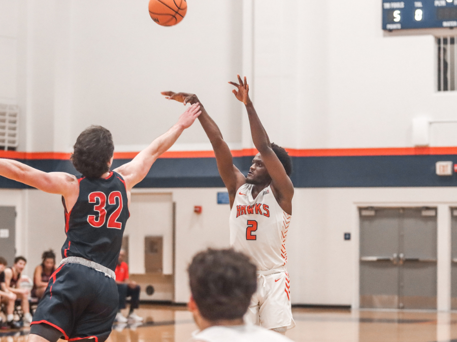 Sophomore+guard+Brandon+Scott+shooting+a+shot+against+Santa+Rosa+Junior+College+on+Jan.+31.+Scott+ended+the+game+with+36+minutes+played%2C+seven+rebounds%2C+30+points+and+the+game-winning+shot.