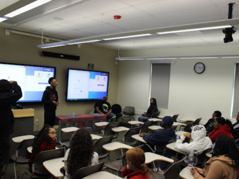 The Umoja Diop Scholars hosted an event in the Winn Center called The Black Creatives: Awaken the Creative in You on Feb. 22 to recognize Black students who want to be entrepreneurs. Photography major Tevin Tyler, speaks about his personal life and that he began to run a business.