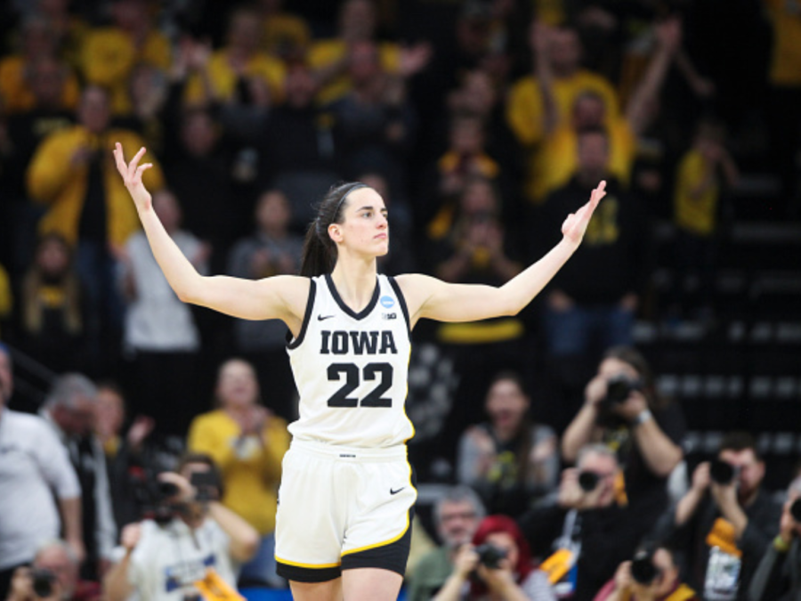 Point+guard+of+the+University+of+Iowa+womens+basketball+team+Caitlin+Clark+celebrating+in-game+in+the+second+round+of+the+2023+NCAA+Womens+Basketball+Tournament+on+March+19.+Clark+scored+a+total+of+191+points+throughout+the+tournament+which+broke+the+record+for+the+most+points+scored+in+a+single+NCAA+Tournament+for+both+mens+and+womens.