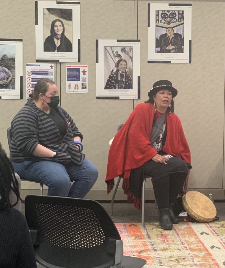 Spiritual activist Gemma Benton on the right sharing a Miwok story and NAHER Clerk November Rain on the left listening in the Center of Inclusion and Belonging on Tuesday. NAHER hosted the event to bring awareness to MMIWG2S.