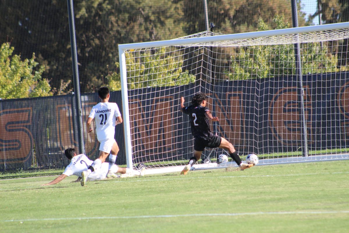 Freshman right back Christian Brenes scores the third goal in first half. CRC leads the first half 3-0, ultimately defeating West Hills 6-0.