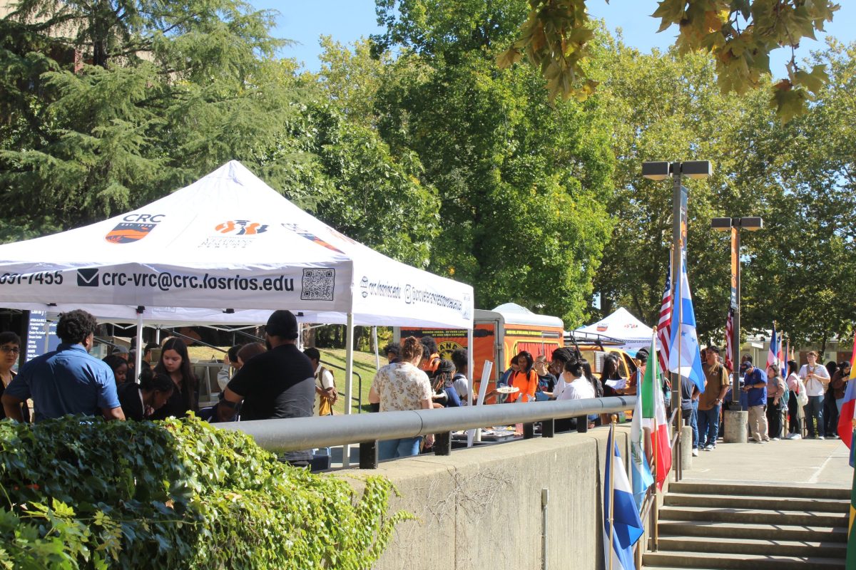 Students and veterans gather in the quad for a Taco Tuesday event held by the Veterans Resource Center, catered by Chando's Tacos. The event helps bring exposure of their organization to students on campus.