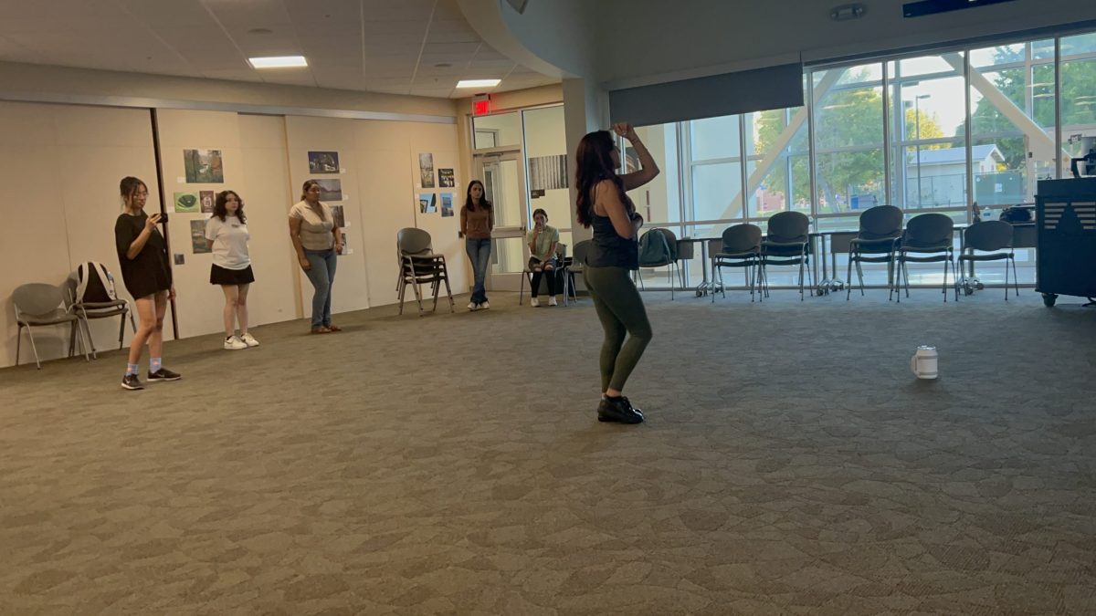 Sacramento based director and choreographer, Morgan Mo Hernandez teaches students bachata on Sept. 28. In addition to teaching dance classes, Hernandez has a dance team called Libertad.