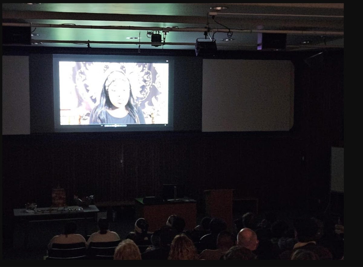 "Under the Door," directed by film and digital media major Biagan Dela Cruz, shows at a film premiere event Friday evening. The CRC RTVF department hosted the event for student filmmakers in the library and nine films were shown.
