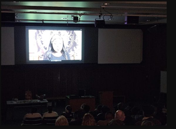 Under the Door, directed by film and digital media major Biagan Dela Cruz, shows at a film premiere event Friday evening. The CRC RTVF department hosted the event for student filmmakers in the library and nine films were shown.
