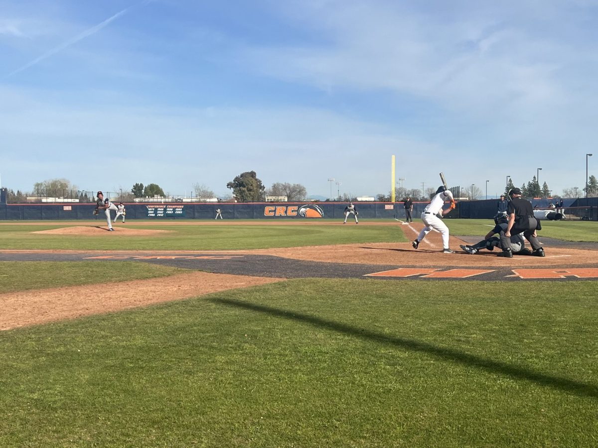 Sophomore outfielder Jack Moore faces West Valley College pitcher on Feb 23. The Hawks went on to defeat the Vikings 14-12.