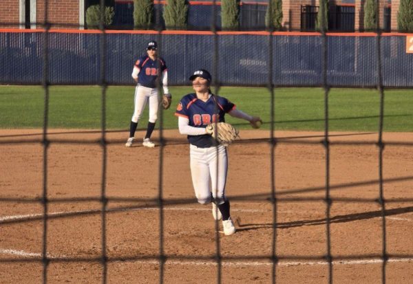 Hawks sophomore pitcher Anjalina Dahdouh winds up for a pitch against the Lassen Community College Cougars.  The Hawks played a double-header against the Cougars winning both games 7-0 and 10-2.