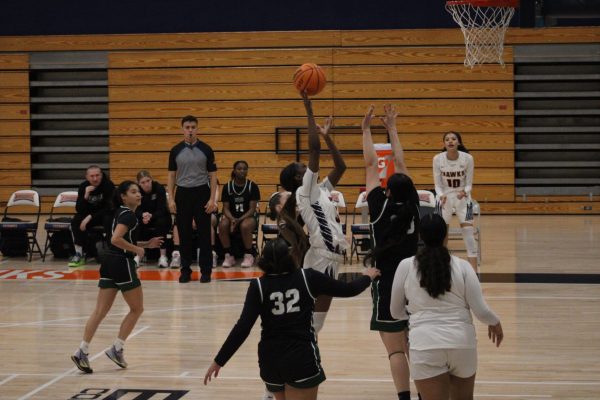 The Hawks sophomore guard LaKayla Hale (middle) going for a floater against Diablo Valley College on Feb. 15, 2024. The Hawks play their second playoff game against Butte College on March 9 at home.