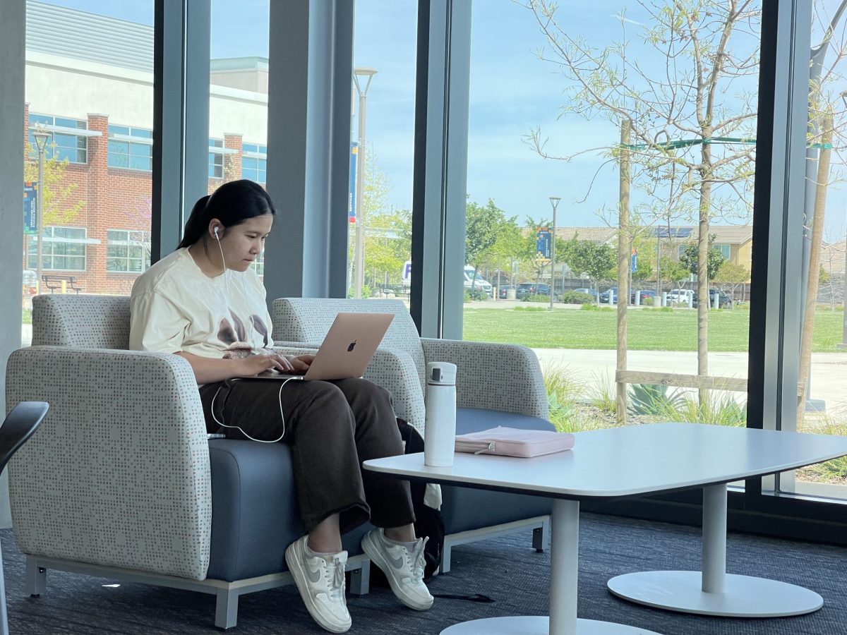 Phuong Nguyen, a 25-year-old pre-health occupations major, studies downstairs in Building B at the Elk Grove Center. A ribbon-cutting for Building B, which opened in January, will take place on May 1.