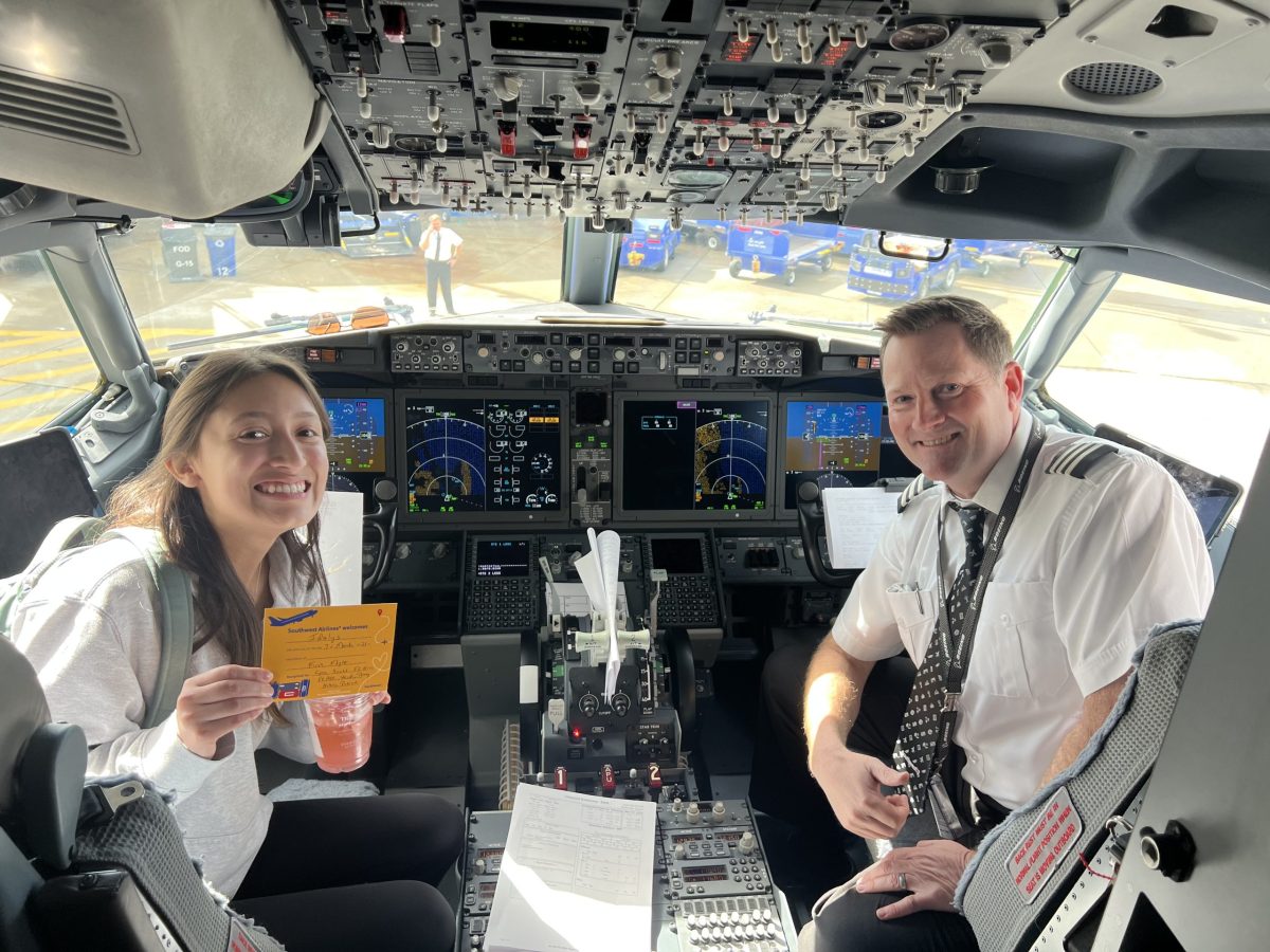 The Connection Features Editor Idalys Aguirre sits in the cockpit of the plane with the pilot holding a postcard after her first flight. The Connection Staff attended the Associated Collegiate Press National College Media Conference in La Jolla, San Diego on March 7.