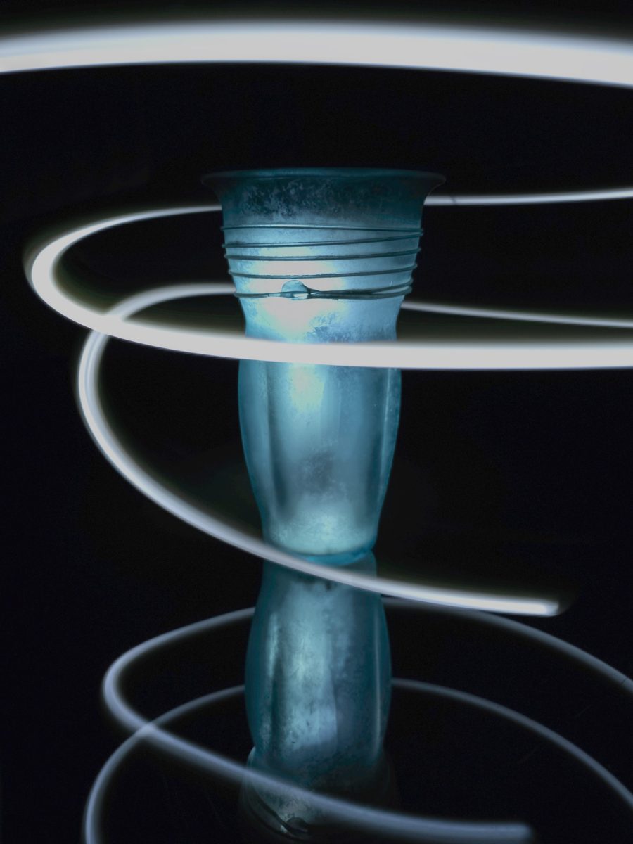 Linda McClendon, 66, who’s retired and taking photography classes for personal fulfillment, takes this photo with a slow shutter speed on a cell phone camera. “The picture is a vase. I shined a flashlight down the middle. The white swirl is a keyring flashlight on a string,” McClendon said.