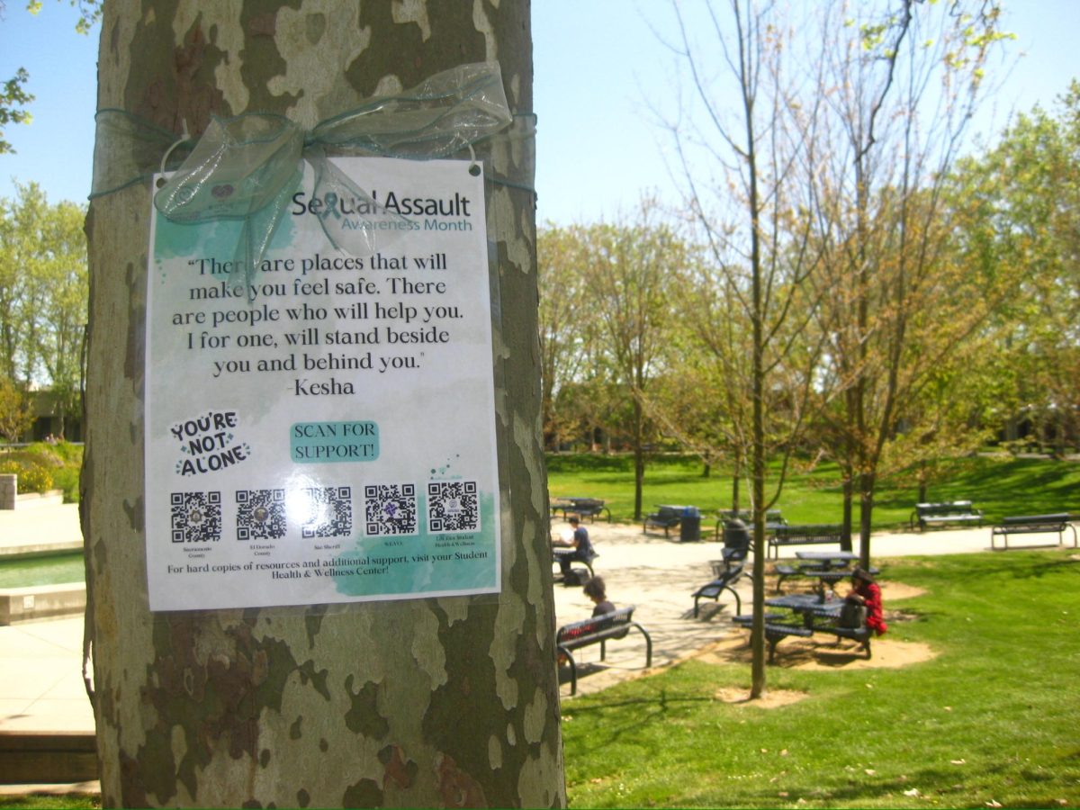  A Sexual Assault Awareness Month flyer on a tree near the water fountains in the quad. WEAVE, the Health and Wellness Center and the Title IX office offer resources to help students who experience sexual assault.