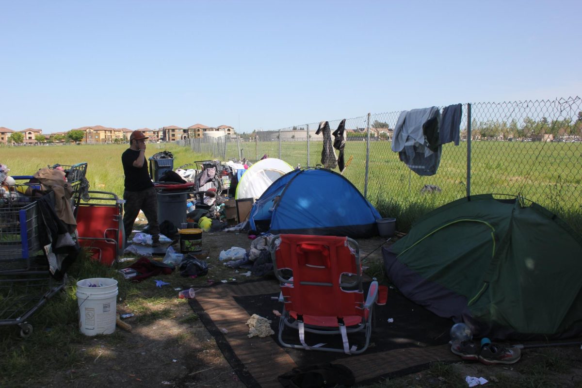 Tents of the unhoused across the street from Cosumnes River College campus on Bruceville Road. The streets may be seen as a better option to unhoused individuals because of poorly run shelters, according to the National Coalition for Homeless. 

