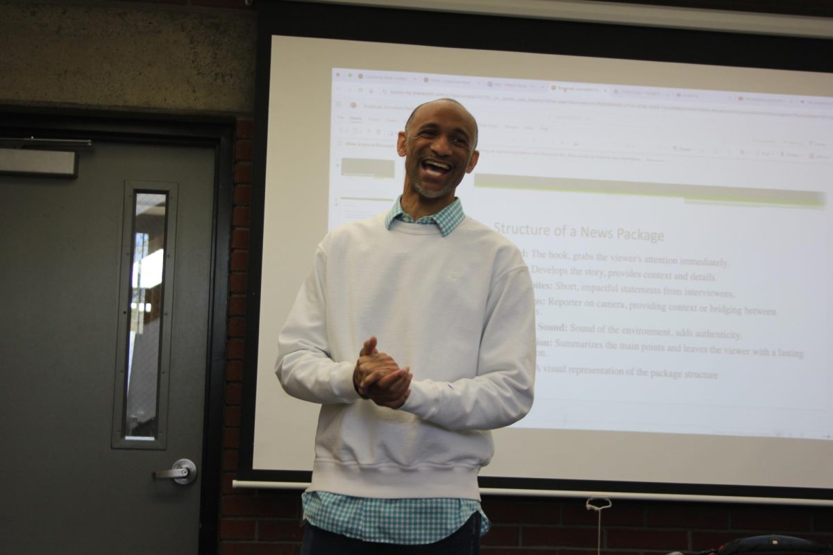 RTVF Professor Kevin John Peters teaching his Wednesday broadcast journalism class in L-102. John said his goal is to prepare students with broadcast skills for the real world.
