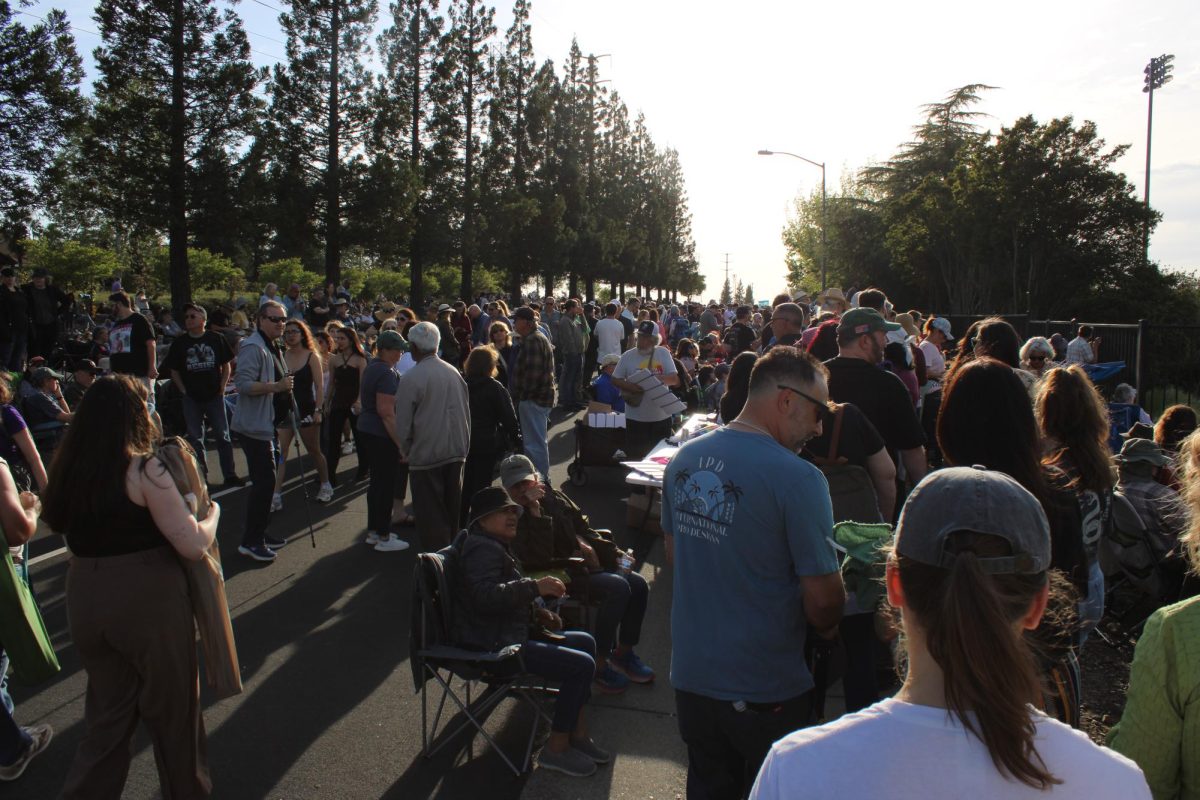 A crowd of protestors gathering at Folsom Lake College on April 15 to attend the “Fighting the Oligarchy” tour. The nationwide tour is an example of civil protest. 