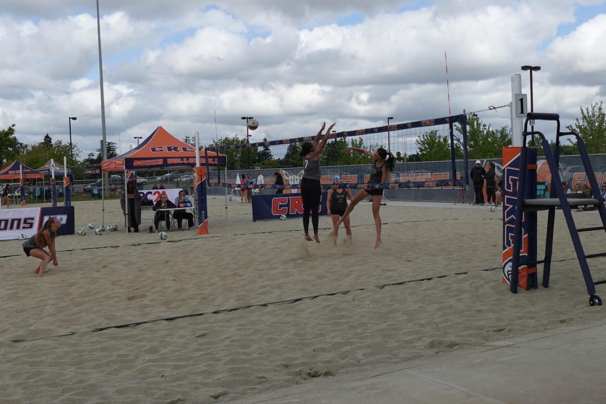 Sophomore big Nicole Risch attempts to block an attack by San Joaquin Delta College during the Big 8 Paris Conference Championship on April 25th. The Hawks wrapped up their season on May 3.