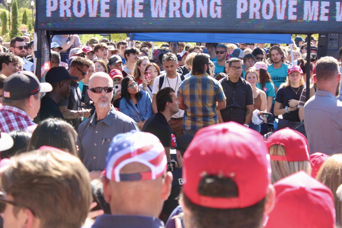 Conservative activist Charlie Kirk (center) during a visit of his “Brainwashed” tour to the University of Nevada, Reno campus in October. Kirk’s tour allowed students to debate him on topics ranging from abortion to the usefulness of getting a college degree.