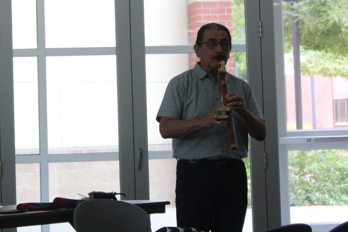 Al Striplen, elder-in-residence at CRC, plays the Native American Flute during NAHER’s Indigenous People’s Day event on Oct. 13. Striplen was one of three elders invited to speak about what indigeneity means to him along with Leny Mendoza Strobel and Denise Marshall-Mills.