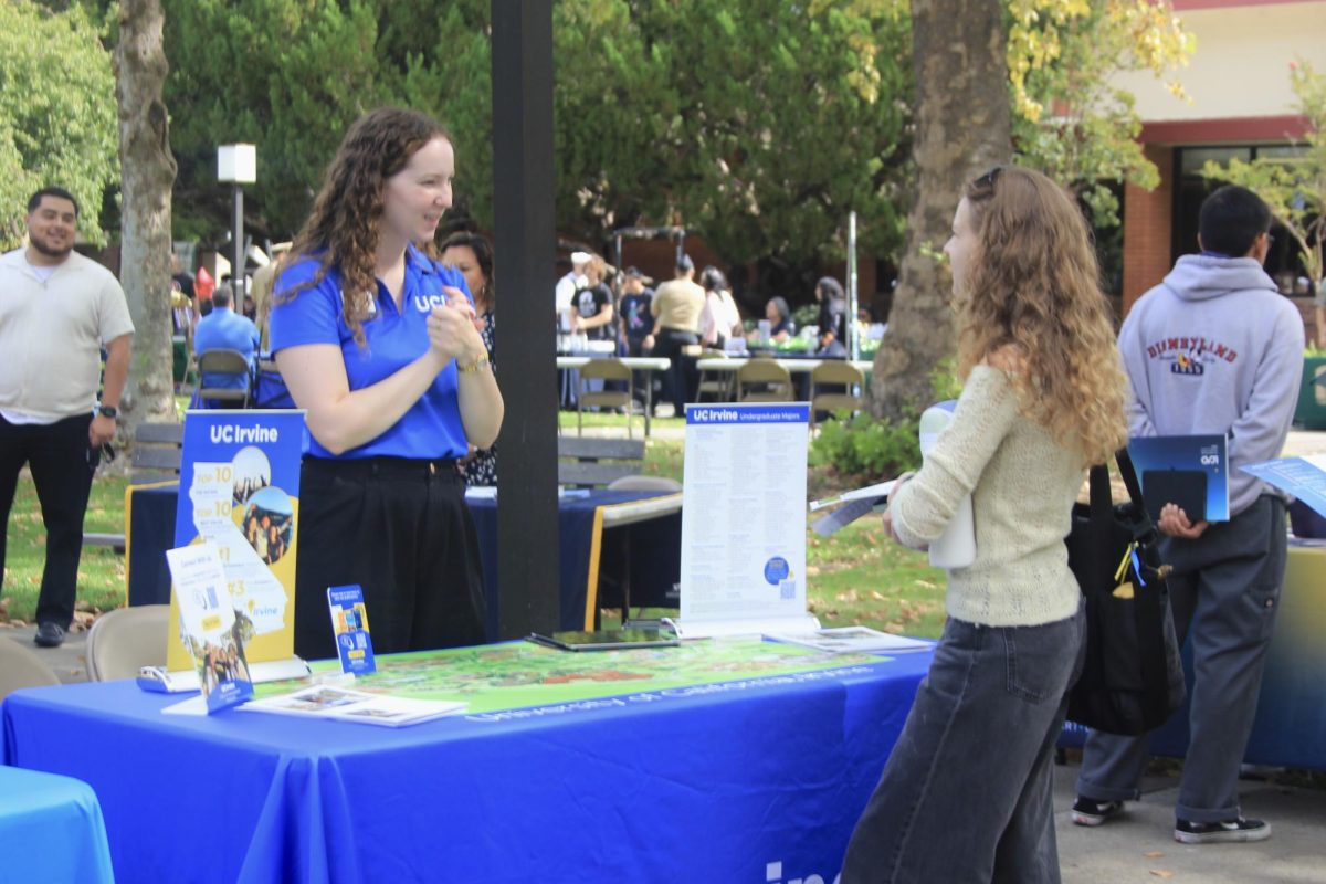A student speaks with an admissions representative from the University of California, Irvine during Sacramento City College’s Transfer Day on Thursday. Cosumnes River College will host over 50 transfer representatives during its Transfer Day on Oct. 7.